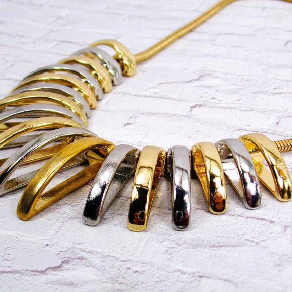 Silver and gold necklace with dome shape metal links attached to a snake chain - Picture 5 of 8